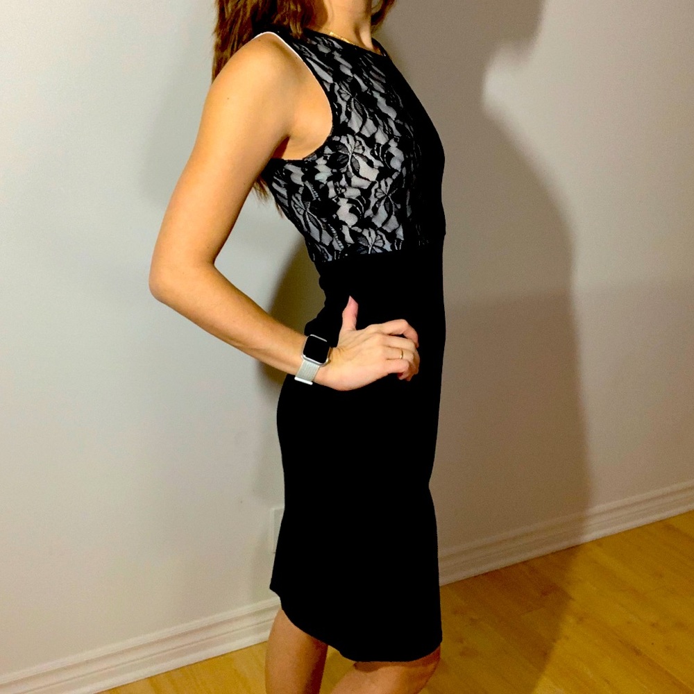 Beautiful black dress with designed sheer top